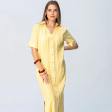 Load image into Gallery viewer, Woman wearing a yellow dress with a plain background