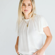Load image into Gallery viewer, Woman wearing a white blouse with a plain background