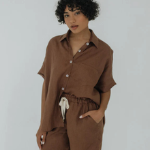 Load image into Gallery viewer, Woman wearing a brown outfit with a plain background