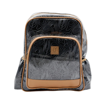 Load image into Gallery viewer, Backpack with black and white pattern and brown leather trim on a white background