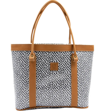 Load image into Gallery viewer, Tote bag with black & white spot pattern and brown leather handles on a white background