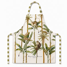 Load image into Gallery viewer, Apron with monkey and plant design on a white background