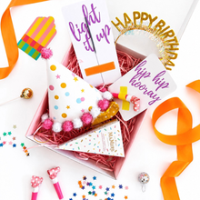 Load image into Gallery viewer, Birthday box gift including party hat, ribbons, and confetti on a white background