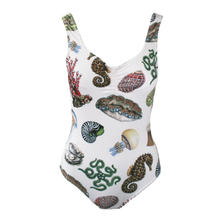 Load image into Gallery viewer, A white one-piece swimsuit featuring an all-over print of various seashells, sea urchins, starfish, and seahorses in green, brown, red, and blue, displayed against a solid white background.