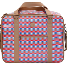 Load image into Gallery viewer, A rectangular overnight bag with a red, blue, and white geometric pattern, tan leather handles and trim, and a front zippered pocket on a white background.