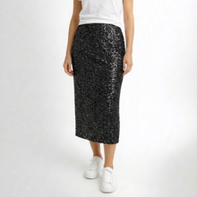 Load image into Gallery viewer, Person wearing a black sequin skirt on a white background