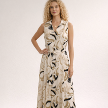 Load image into Gallery viewer, Woman wearing a sleeveless dress with abstract pattern on a plain background