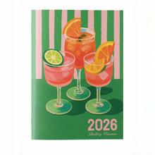 Load image into Gallery viewer, Planner cover with cocktail illustration and '2026' text on a green background