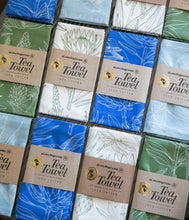 Load image into Gallery viewer, A Love Supreme Tea Towel - Bloom Essence Cream on Blue
