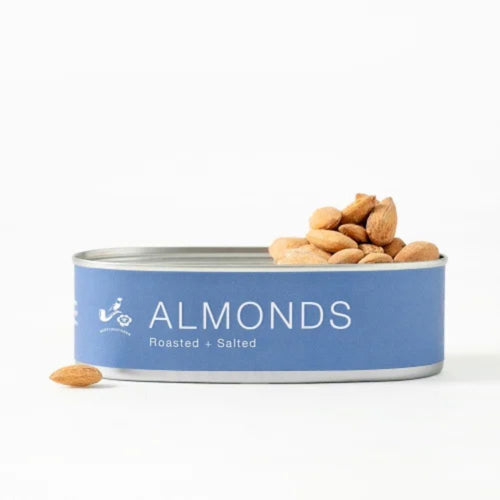 Can of Babylonstoren almonds with a blue label on a white background