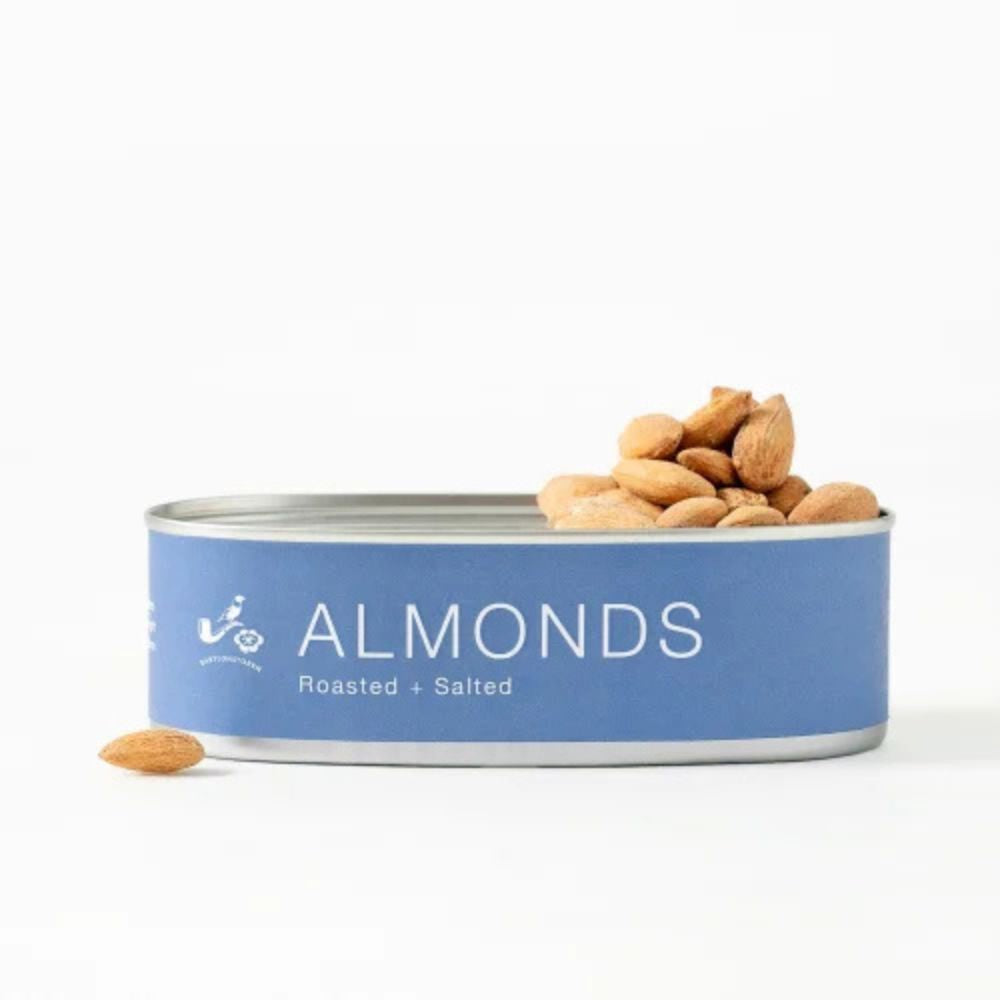 Can of Babylonstoren almonds with a blue label on a white background