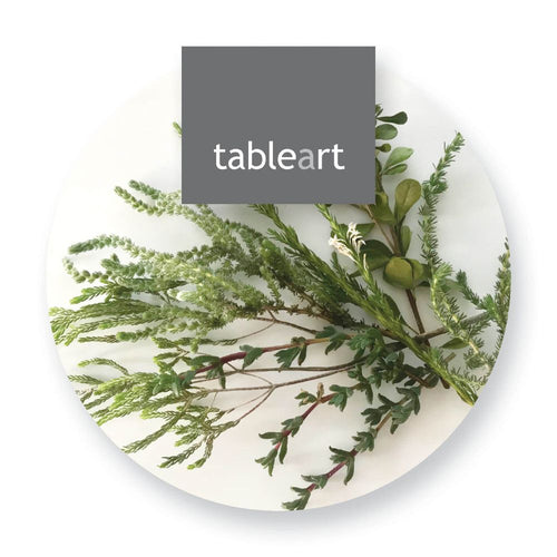 Set of coasters with green foliage and 'tableart' branding on a white background