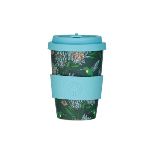 Reusable coffee cup with blue lid and sleeve featuring a floral pattern on a white background