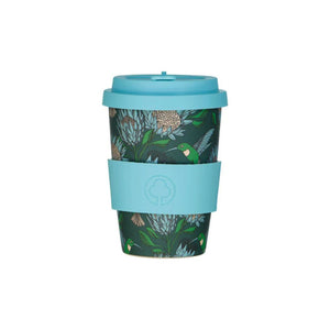 Reusable coffee cup with blue lid and sleeve featuring a floral pattern on a white background