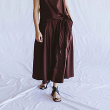 Load image into Gallery viewer, Person wearing a brown dress standing on a white background
