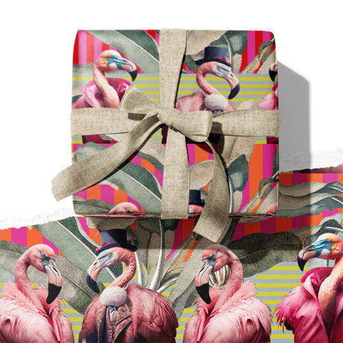 Gift box with flamingo design and ribbon on a colorful background