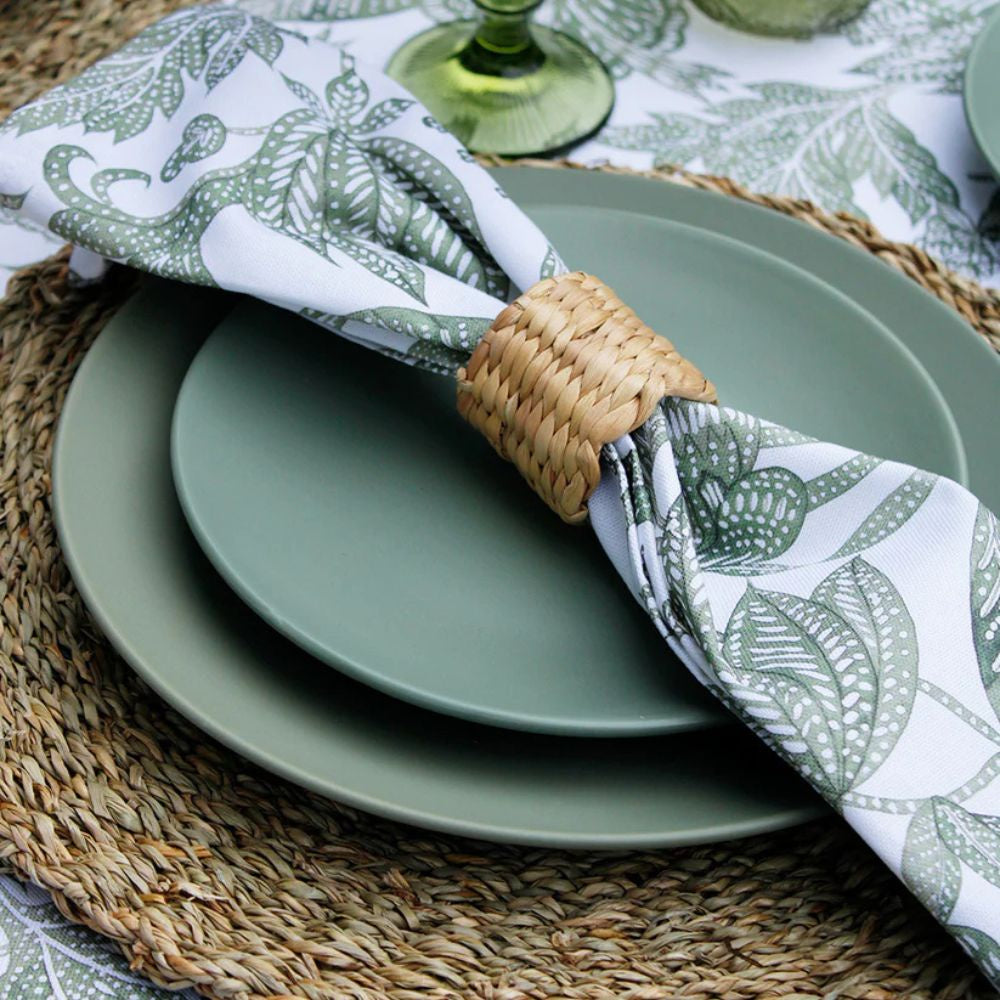 Green & white batik print napkin on table setting