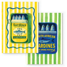 Load image into Gallery viewer, Two notebooks with vintage-style sardine can designs on striped backgrounds.

