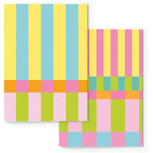 Load image into Gallery viewer, Two colorful checkered notebooks with a geometric pattern on a white background.
