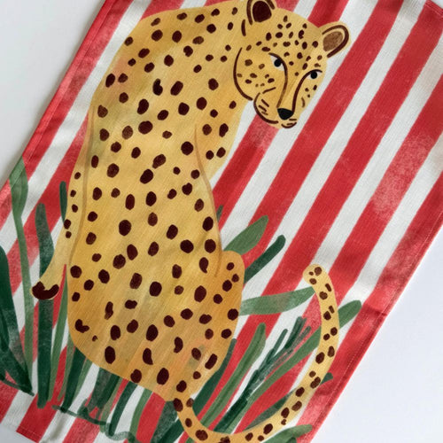 Tea towel with Leopard illustration on a red and white striped background