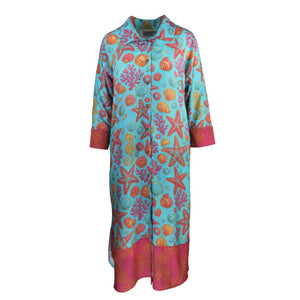 Colorful dress with marine pattern on a white background