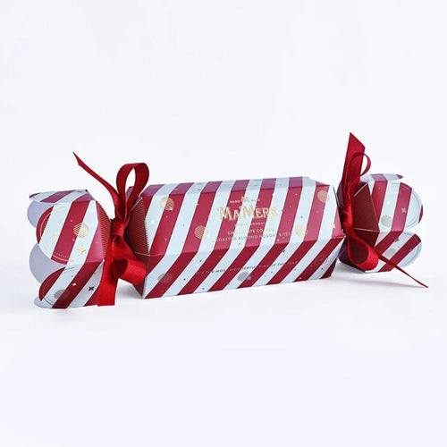 Red and white striped Christmas cracker with a bow on a white background