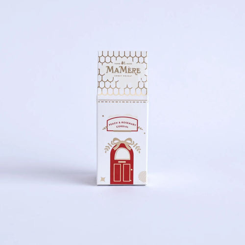 MaMère peach & rosemary cordial in a gold & red christmas house box