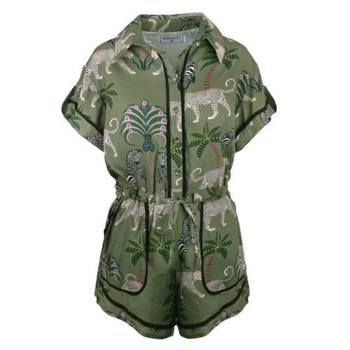 Green jumpsuit with animal and plant pattern on a white background
