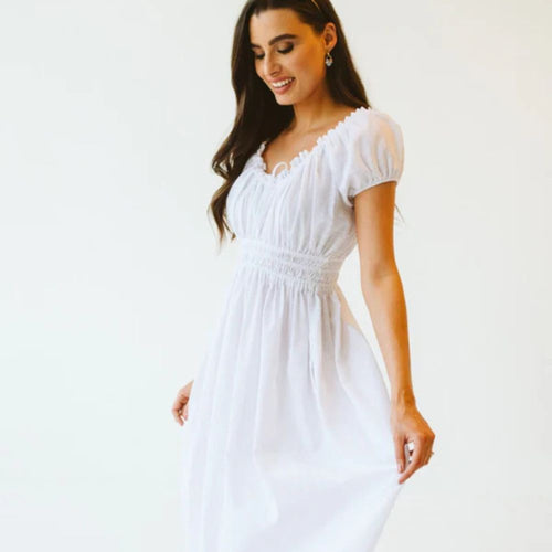 Model wearing white summer dress 