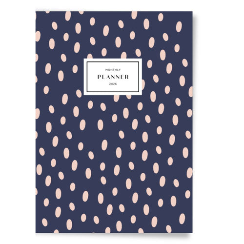 Monthly Planner with pink dot pattern on a blue background