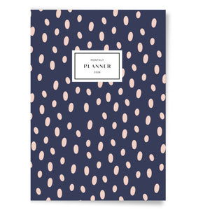 Monthly Planner with pink dot pattern on a blue background
