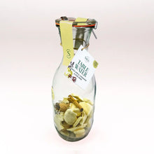 Load image into Gallery viewer, Glass carafe containing apple, star anise &amp; cardamom table water infusions
