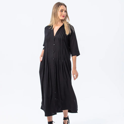 Woman wearing a black dress on a white background