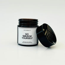 Load image into Gallery viewer, Black candle jar with &#39;Go Smudge Yourself&#39; text on a white background
