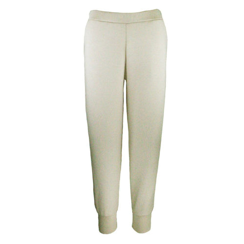 Cream sweatpants on a white background