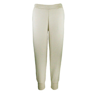 Cream sweatpants on a white background