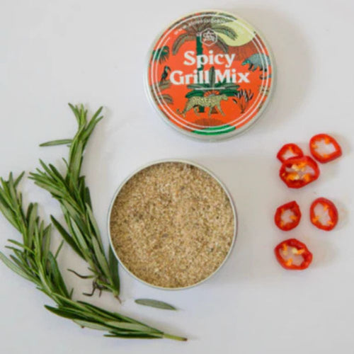 Spicy Grill Mix container with rosemary and red peppers on a white background