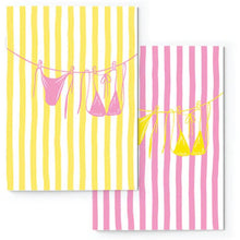 Load image into Gallery viewer, Two notebooks with bikini illustrations on yellow and pink striped backgrounds.
