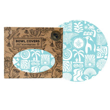Load image into Gallery viewer, Bowl covers with a blue &amp; white tropical design in a cardboard packaging
