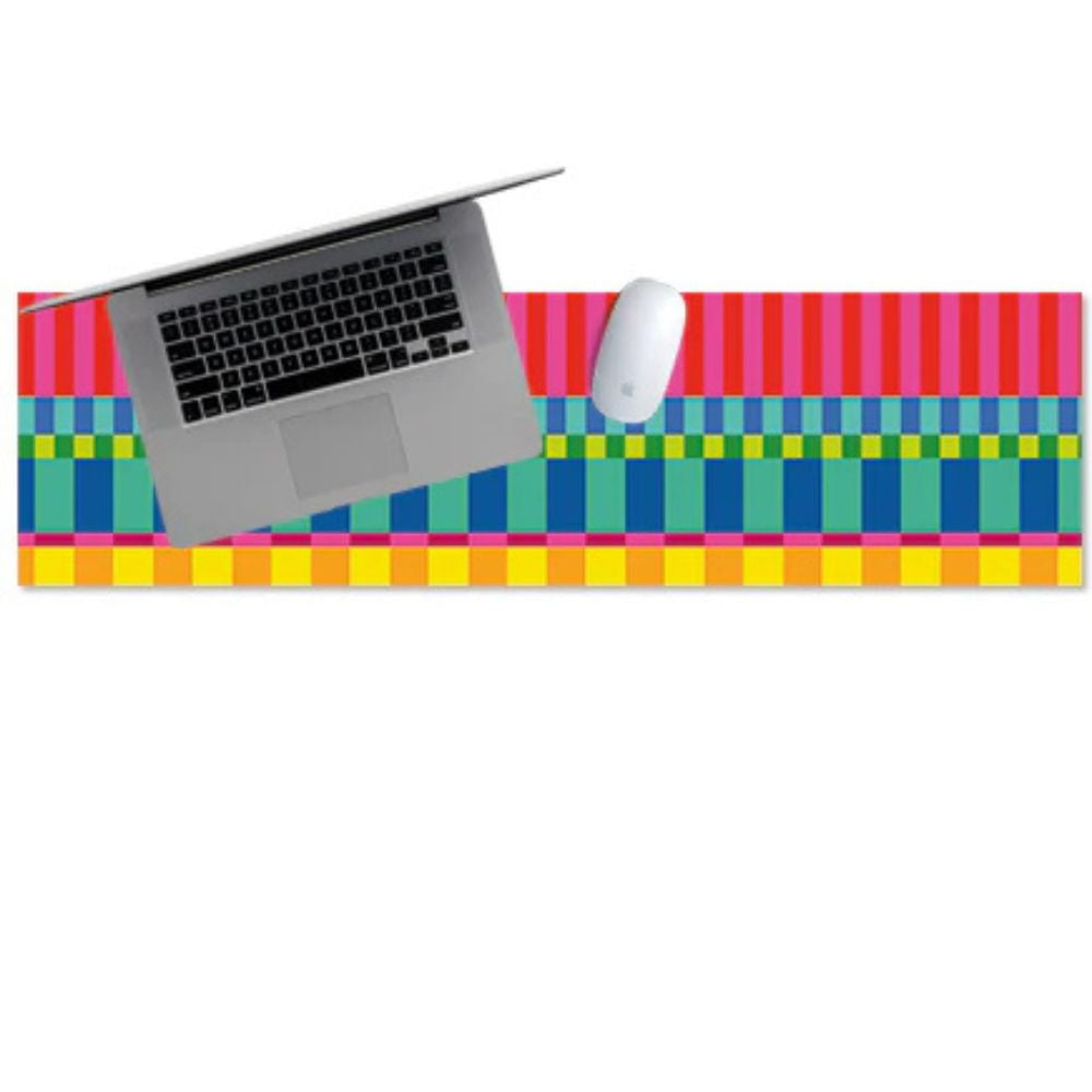 Colorful striped desk mat with a laptop and mouse on a white background