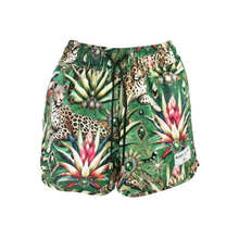 Load image into Gallery viewer, Tropical-themed shorts with leopards and plants on a white background
