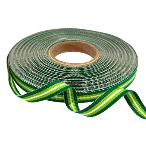 Roll of green and white striped ribbon on a white background