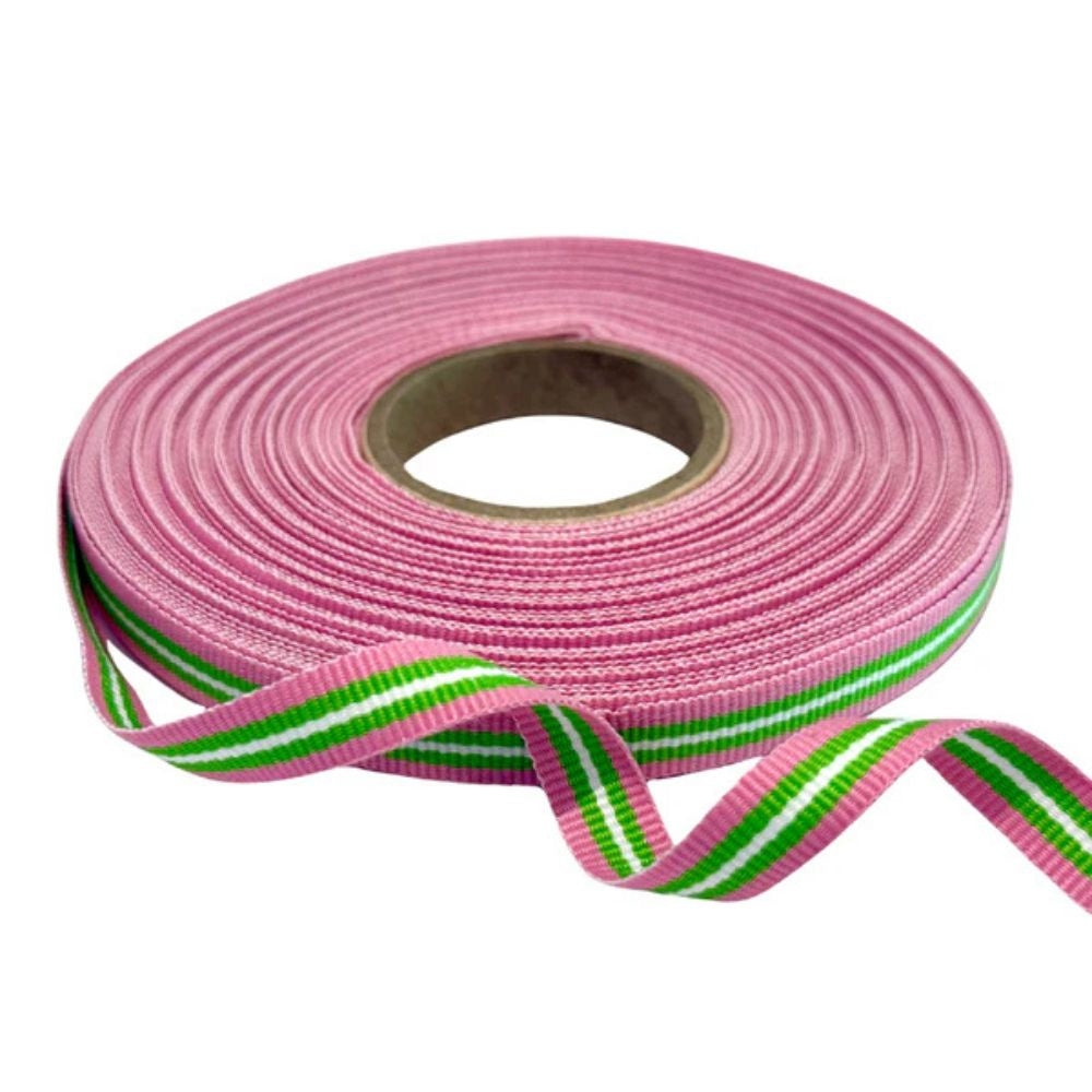 Roll of pink ribbon with green and white stripes on a white background