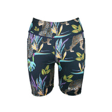 Load image into Gallery viewer, Black athletic shorts with colorful animal and plant pattern on a white background
