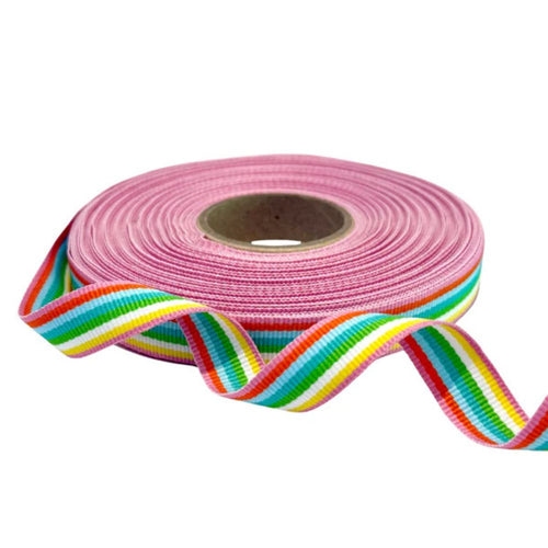 Roll of pink ribbon with a colorful stripe on a white background