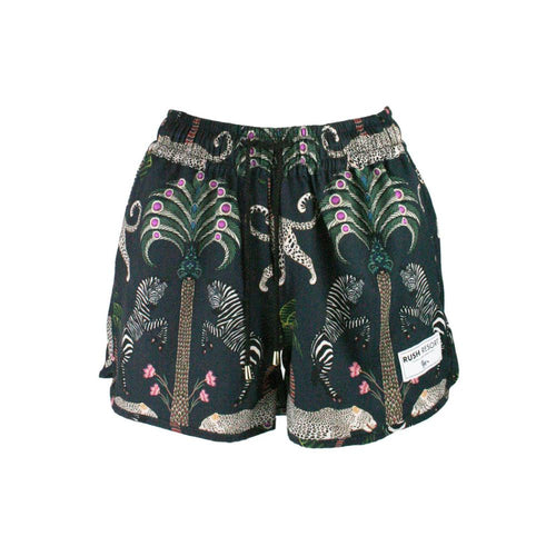 Shorts with animal and nature pattern on a white background