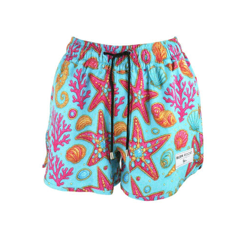 Colorful swim shorts with starfish and coral pattern on a white background