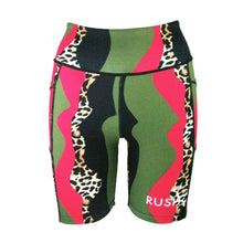 Load image into Gallery viewer, Colorful athletic shorts with wavy patterns and animal print accents on a white background
