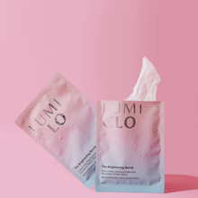 Load image into Gallery viewer, Two LUMI CLO skincare products on a pink background
