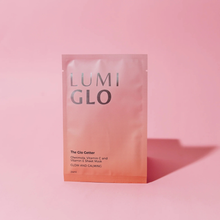 Load image into Gallery viewer, LUMI GLO sheet mask packaging on a pink background
